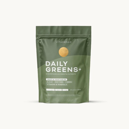 Groene "DAILY GREENS+" zak met gouden cirkel en tekst.