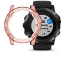 Roze TPU hoesje naast een zwarte Garmin Fenix smartwatch met een roze band.