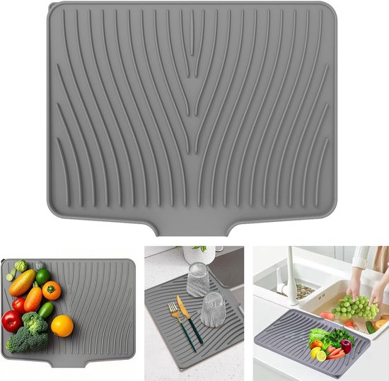 Deze siliconen afdruipmat voor op het aanrecht is antislip, heeft drainagegaten en is Deze siliconen afdruipmat voor op het aanrecht is antislip, heeft drainagegaten en is
