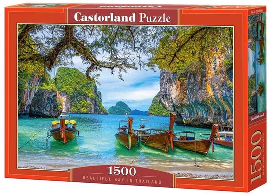 Castorland puzzeldoos met 1500 stukjes, met een afbeelding van een tropische baai in Thailand met houten boten op het turquoise water.