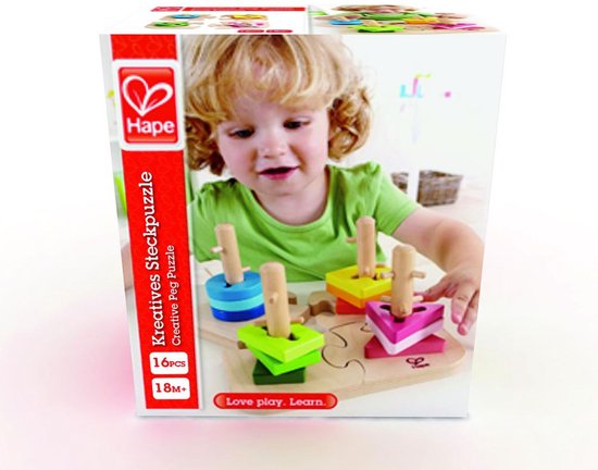 Hape Creatives Steckpuzzel. Jong kind speelt met de houten vormpuzzel met blauwe, groene, roze en gele blokken.