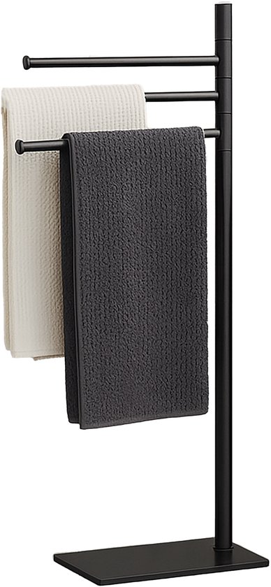 Porte-serviettes noir avec trois barres pivotantes, avec une serviette beige et une grise.