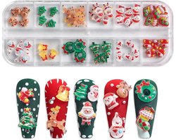 Creëer prachtige kerstnagelkunst met deze doos vol hangers - kerstman en rendier motieven met 3D sneeuwpop en edelstenen voor doe-het-zelf nageldecoratie. Maak je nagels feestelijk!