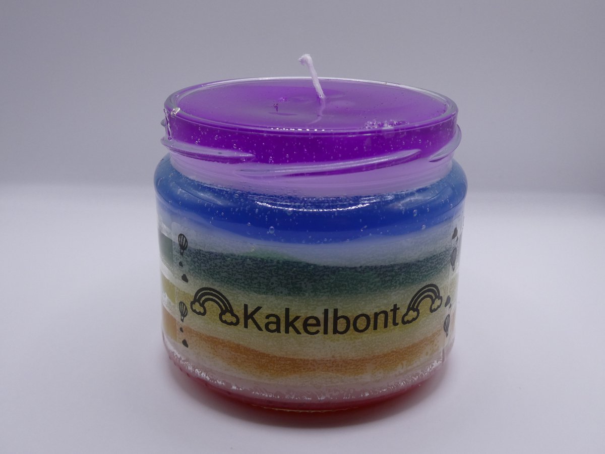 Kaars in pot. Kakelbont. Allerlei geuren, gel wax en paraffine.