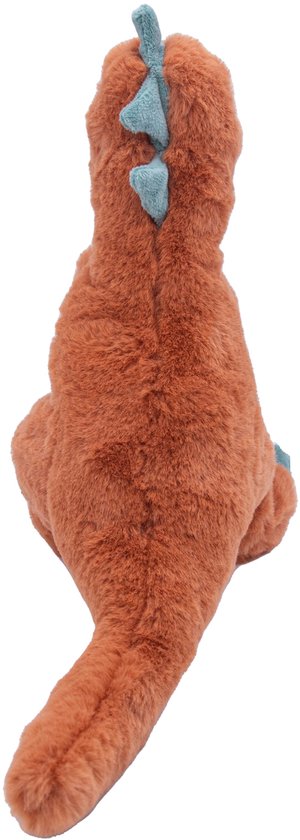 Zijaanzicht van oranje dinosaurus knuffel, zittend. Groene stekels op rug, lange staart.