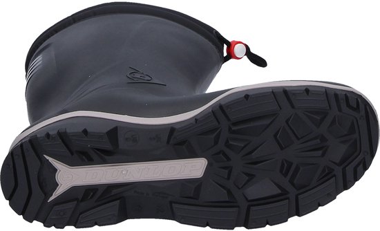 Zwarte Dunlop regenlaars op zijn kant, met vulling en de zool zichtbaar.
