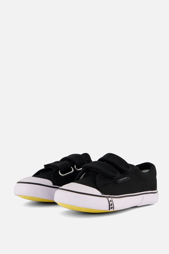 Paire de baskets noires en toile avec fermeture velcro et semelles blanches, vues de dessus.
