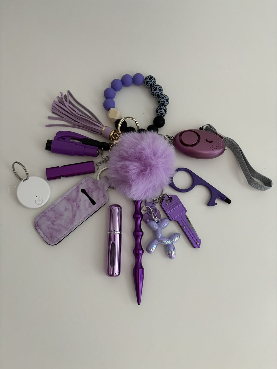 Zelfverdedigings sleutelhanger paars medium