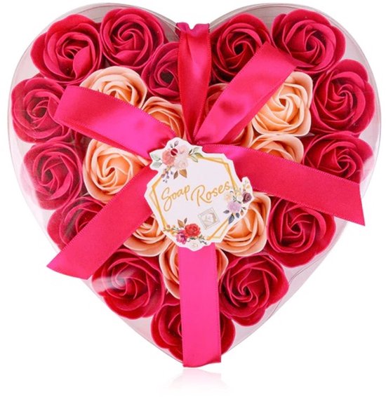 Boîte transparente en forme de cœur remplie de 24 roses en savon roses et pêche, avec un ruban rose et une étiquette 'Soap Roses'.