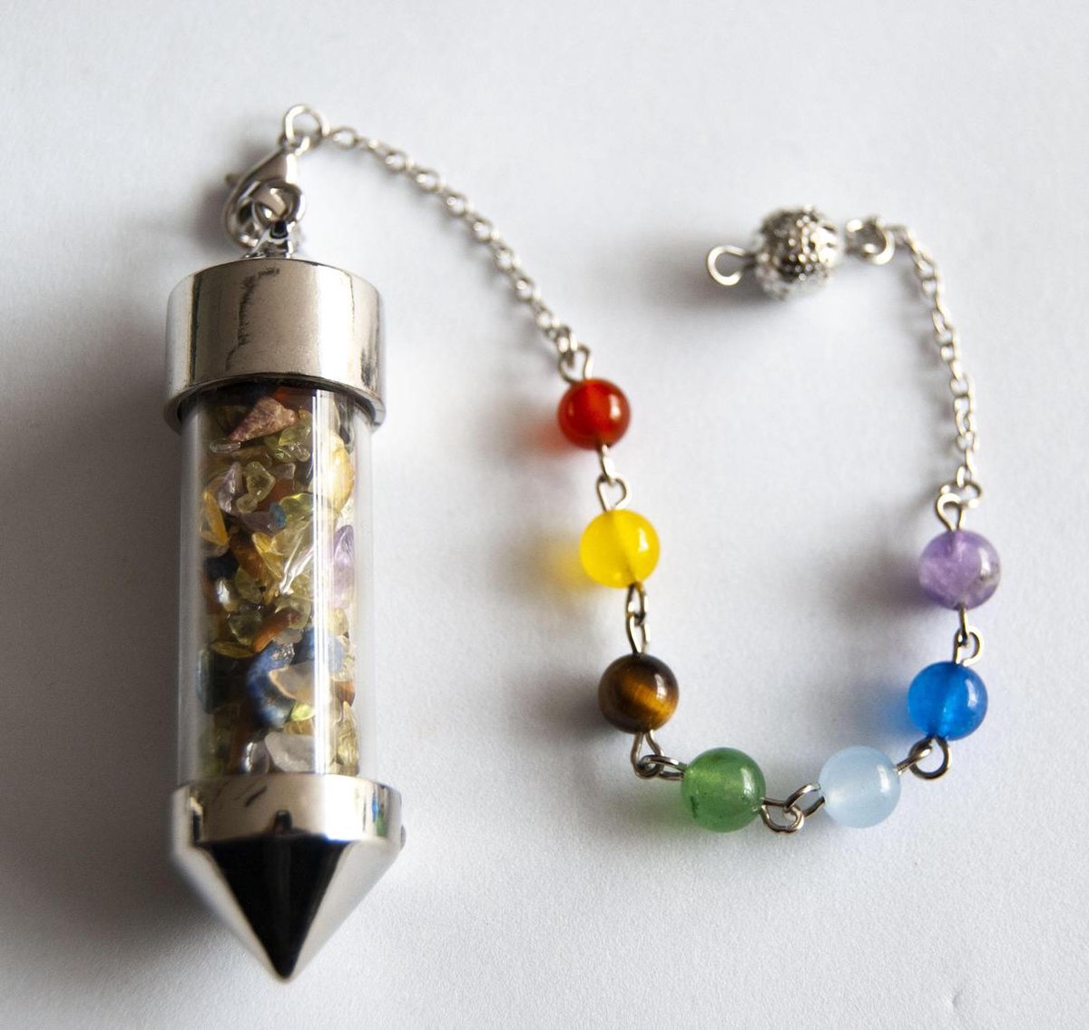Chakra pendel en hanger. Edelsteen. Spiritualiteit. Amethist.