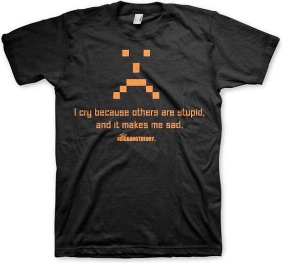 Zwart T-shirt met oranje pixelated gezicht en tekst: 'I cry because others are stupid, and it makes me sad. #BIGBANGTHEORY'.