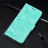 Kanten bloem reliëfpatroon horizontaal leren flip-hoesje voor iPhone 11 Pro Max, met houder & kaartsleuven & portemonnee & fotolijst & lanyard (groen)