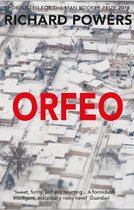 Boek 'Orfeo' van Richard Powers, met een witte winterse luchtfoto van huizen.
