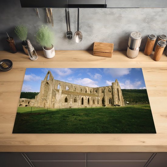 KitchenYeah® Inductie beschermer 81x52 cm - Zijaanzicht van de Tintern Abbey in Wales - Kookplaataccessoires - Afdekplaat voor kookplaat - Inductiebeschermer - Inductiemat - Inductieplaat mat
