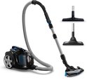 Philips PowerPro Expert stofzuiger met slang en twee opzetstukken op witte achtergrond.