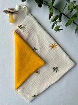 Sucette Julé Design jaune / fleurs blanches