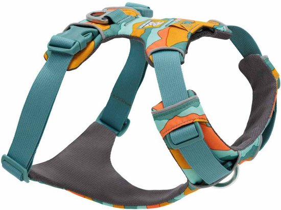 Harnais pour chien avec motif ondulé orange, vert et jaune, sangles bleues et doublure grise.