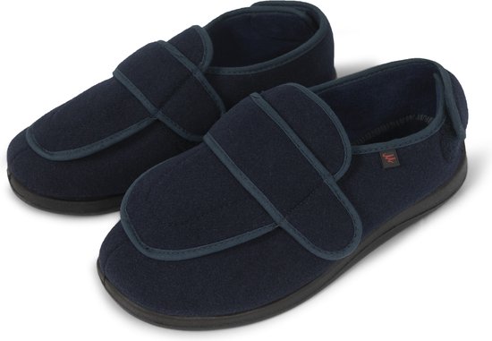 Paar donkerblauwe verbandschoenen met klittenbandsluiting en een rode 'M' logo.