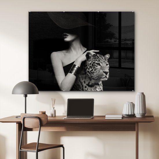 MuchoWow® Glasschilderij 120x90 cm - Schilderij acrylglas - Vrouw - Luipaard - Luxe - Zwart - Wit - Dier - Foto op glas - Muurdecoratie woonkamer - Wanddecoratie slaapkamer - Schilderijen