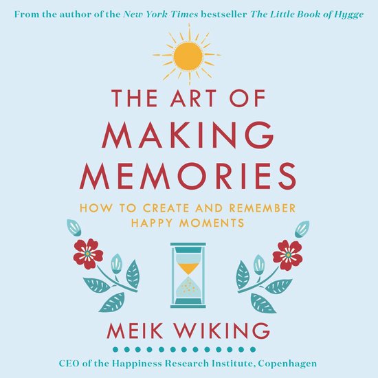 Livre 'The Art of Making Memories' par Meik Wiking. Avec un soleil, un sablier et des fleurs.