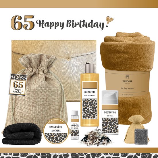 Wellness geschenkset met bruine handdoek, zwarte handdoeken, panterprint douchegel, bodylotion, handgel en een zakje.