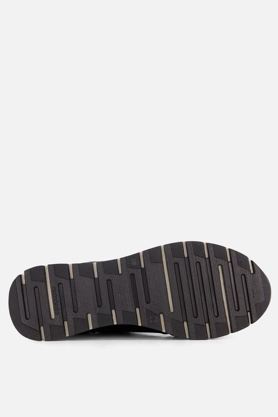 Zool van een zwarte Remonte sneaker met profiel.