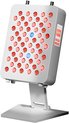Wit roodlichtapparaat met 7 golflengten, inclusief blauw licht, en touchscreen display.