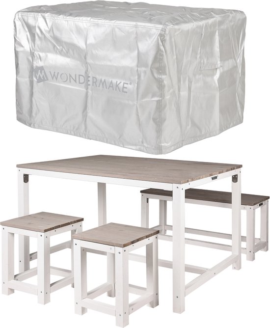 Zilverkleurige beschermhoes met "WONDERMAKE" logo, boven een wit met grijs houten tafel en krukken.