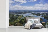 Behang - Fotobehang Luchtfoto van een rivier in Colombia - Breedte 450 cm x hoogte 300 cm