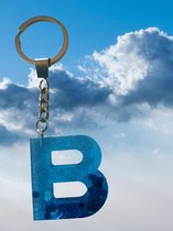 Epoxy letter sleutel- of tassenhanger B, glitter blauw