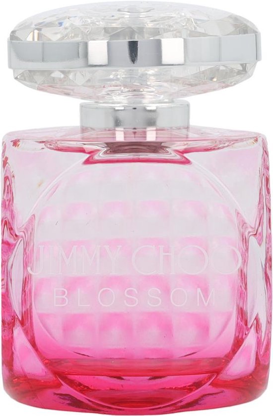 Roze parfumfles van Jimmy Choo Blossom met een glanzende, gefacetteerde dop.