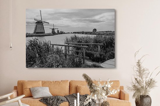 Photo Zwart et blanc des moulins à vent de Kinderdijk aux Nederland Toile 180x120 cm - Tirage photo sur toile (Décoration murale salon / chambre) XXL / Groot format!