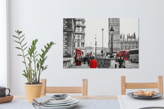 Photo Zwart et blanc d'une femme en robe rouge Toile 90x60 cm - Tirage photo sur toile (Décoration murale salon / chambre)