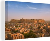 Canvas Schilderij Uitzicht op het gouden fort en op Jaisalmar in India - 90x60 cm - Wanddecoratie