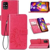 Voor Samsung Galaxy M31s vierbladige gesp reliëf gesp mobiele telefoon bescherming lederen tas met lanyard & kaartsleuf & portemonnee & houder (magenta)