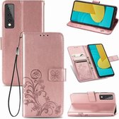 Voor LG Stylo 7 vierbladige gesp reliëf gesp mobiele telefoon bescherming lederen tas met lanyard & kaartsleuf & portemonnee & beugel functie (rose goud)