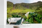 Behang - Fotobehang De groene natuur bij een klif op de Azoren - Breedte 600 cm x hoogte 400 cm