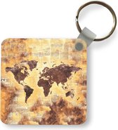 Sleutelhanger - Uitdeelcadeautjes - Wereldkaart - Stippen - Kleuren - Plastic
