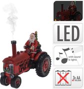 Kerstman op tractor met licht 28cm - Met geluid - Met echte rook
