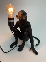 Zittende apenlamp zwart 31 cm hoog