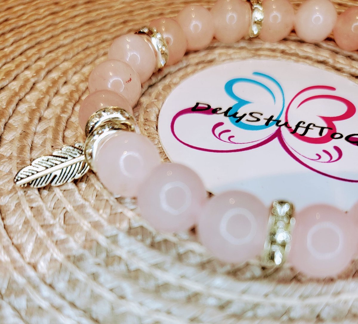 Rozenkwarts armband met veer