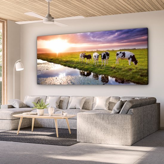 Tableau sur toile Vaches pendant un coucher de soleil - 160x80 cm - Décoration murale Art