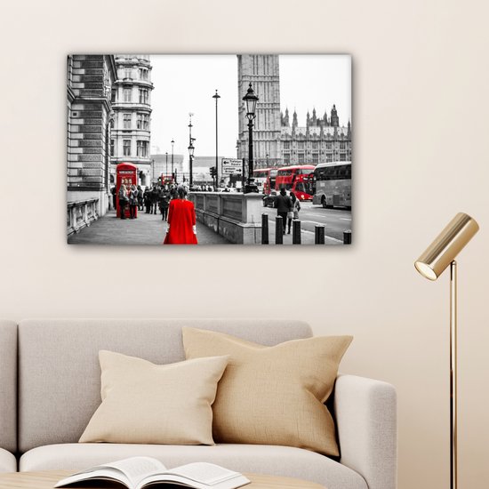 Photo Zwart et blanc d'une femme en robe rouge Toile 180x120 cm - Tirage photo sur Toile (Décoration murale salon / chambre) XXL / Groot format!