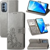 Voor OnePlus Nord N200 5G Vierbladige Sluiting Reliëf Gesp Mobiele Telefoon Bescherming Lederen Case met Lanyard & Kaartsleuf & Portemonnee & Beugel Functie (Grijs)