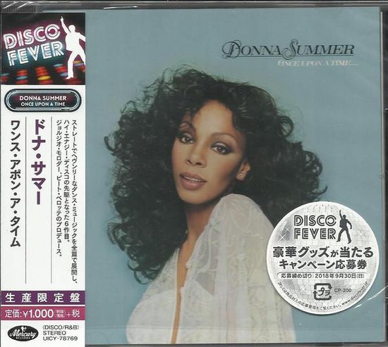 Donna Summer met een volumineuze bos krullen, gekleed in een witte kanten top. Tekst 'Donna Summer Once Upon A Time...'.