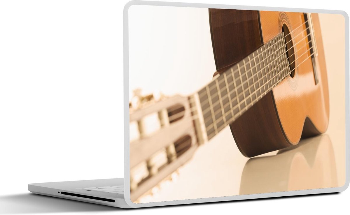 Laptop sticker - 17.3 inch - Een Akoestische gitaar ligt op de zij - 40x30cm - Laptopstickers - Laptop skin - Cover