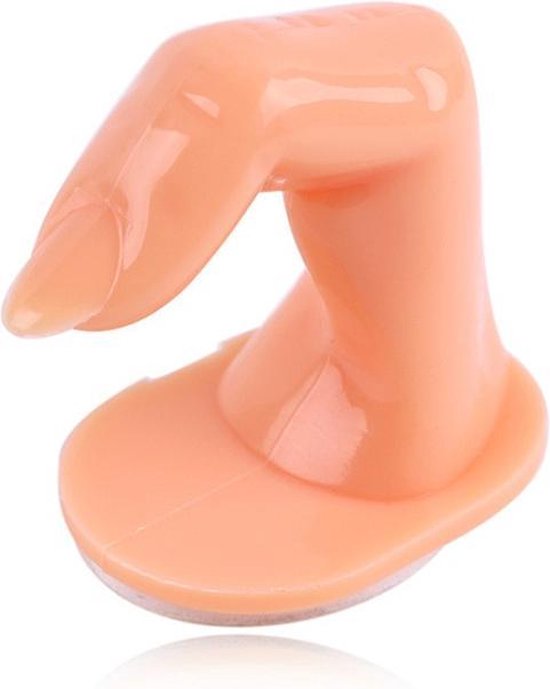 Doigt d'entraînement pour nail art, couleur chair avec un ongle vernis, posé sur une base.