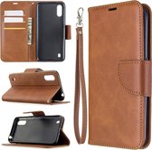 Voor Galaxy A01 retro lamsvacht textuur pure kleur horizontale flip pu lederen case met houder & kaartsleuven & portemonnee & lanyard (bruin)
