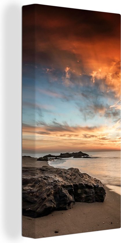 Canvas Schilderij Strand - Stenen - Avond - Lucht - Natuur - 20x40 cm - Wanddecoratie