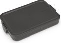 Boîte à lunch Brabantia gris foncé fermée, modèle plat, en plastique.